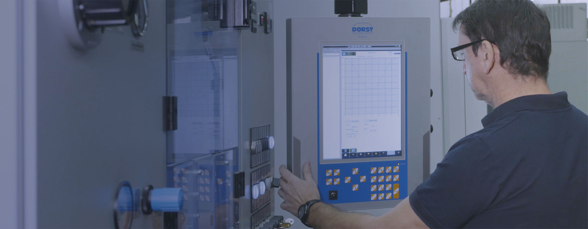 technician controls machine