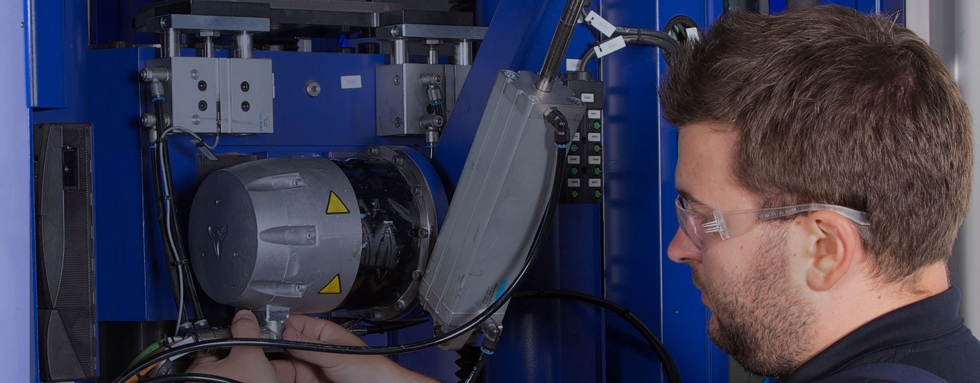 Technician servicing press