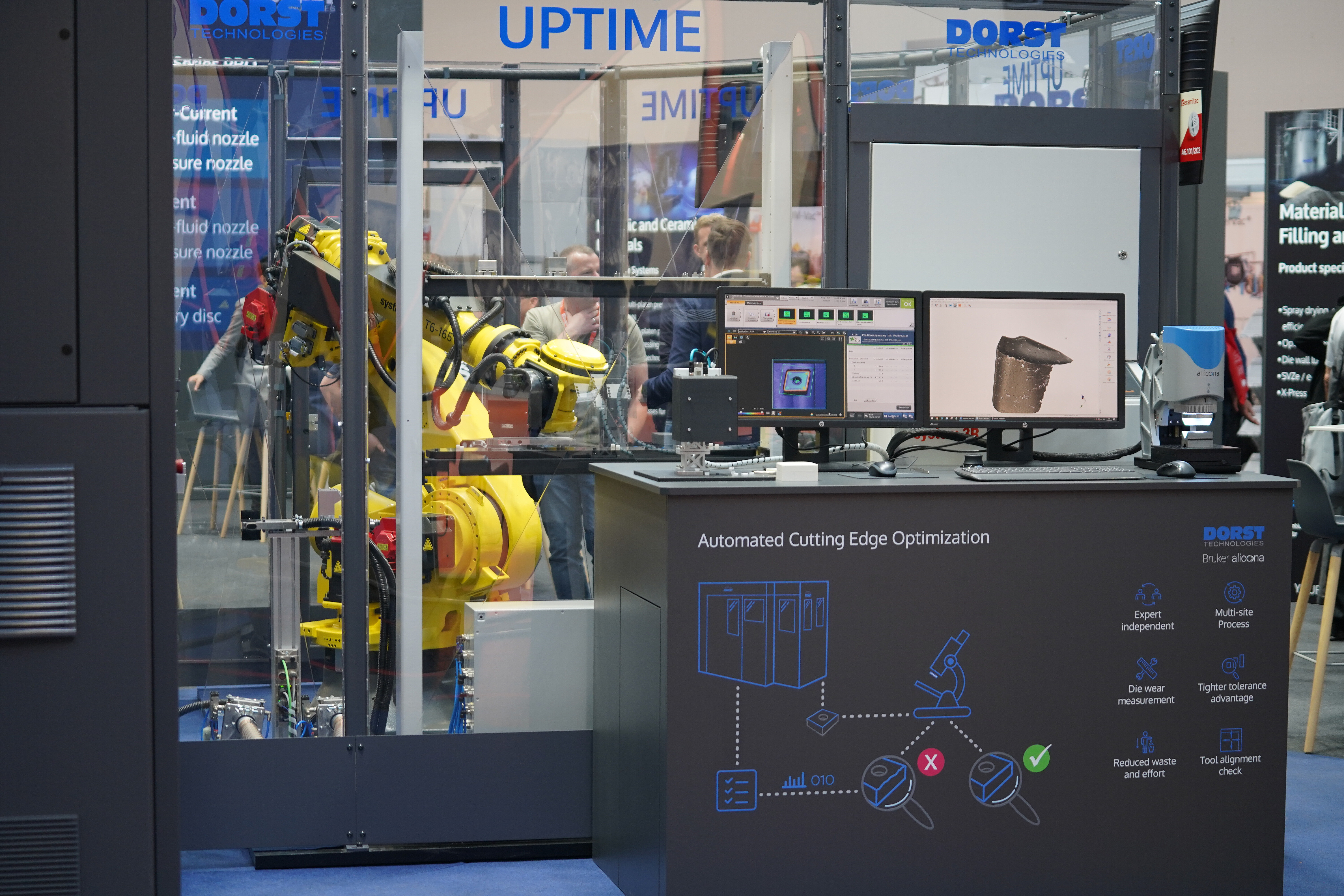 UPTIME automated part-changeover cell for robot-guided tooling and powder-system exchange in powder pressing operations
