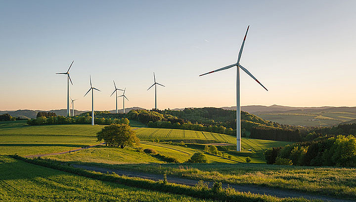 wind turbines on a wide green area